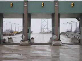 Unused booths at the entrance to the second span of the Ambassador Bridge are pictured Tuesday, April 3, 2018.