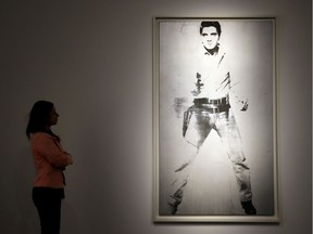 A painting by Andy Warhol called 'Double Elvis [Ferus Type]' (1963) is displayed at Christie's in London, April 5, 2018. The painting will be auctioned in New York on May 17 and carries a price tag in the region of US$30 million.