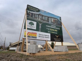 A sign for the 131-unit Oakdale Trails condo development off of Sprucewood Avenue in LaSalle, ON. is shown on Thursday, April 17, 2018.