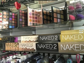 This April 12, 2018, photo released by the Los Angeles Police Department shows counterfeit cosmetics to be seized by police in the Santee Alley area of Los Angeles. $700,000 worth of counterfeit cosmetics seized from vendors in downtown's fashion district have tested positive for bacteria, lead and traces of animal feces, Los Angeles police said Monday, April 16, 2018.