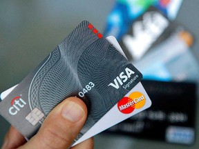 Credit cards are shown in this 2017 file photo.