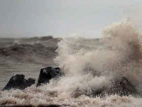 Waves crash against rocks at Leamington's shoreline in December 2015.