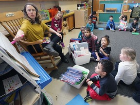Felicia Abela, a SK/JK teacher at the Giles Campus French Immersion Public School, leads her class in a lesson Monday.