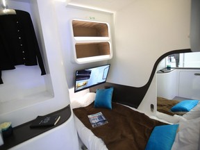 A bed and wardrobe sit inside a Airbus A350 'Day and Night' passenger jet cabin on the Airbus SE exhibition stand at the Aircraft Interiors Expo in Hamburg, Germany, on Wednesday, April 11, 2018.