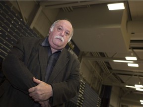 Dan Castellan, the University of Windsor's manager of facilities, planning, renovation and construction, is shown April 25, 2018, next to HVAC units at the St. Denis Centre that will be eventually replaced with greener units on the roof.