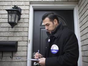 Windsor West Progressive Conservative candidate Adam Ibrahim campaigns along St. Clair Avenue  in South Windsor on  April 18, 2018.