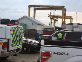 OPP and Essex-Windsor EMS vehicles at the scene of a fatal industrial accident at a work site on Walker Road on the morning of April 12, 2018.