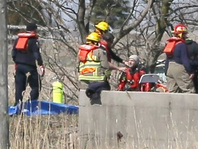 OPP divers at the scene of a fatal crash at County Road 42 and Big Creek in Lakeshore on the morning of April 22, 2018.