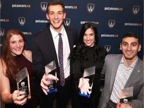 The University of Windsor held their annual Evening of Excellence Awards Banquet on Thursday, April 5, 2018, to recognize the accomplishments of student athletes. Major awards winners, from left, include, Sarah Mitton, DeMarco Award, John Moate, male athlete of the year, Kelsey Balkwill, female athlete of the year, and Mike Rocca, DeMarco Award.