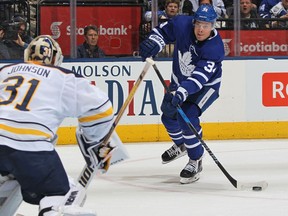 Auston Matthews looks to take a shot on Chad Johnson during an NHL game at the Air Canada Centre on April 2, 2018