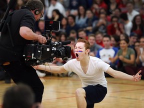 Holy Names Catholic High School student Tyler White, 17, gets some face time on camera on March 26, 2018 during an appearance by television personality Rick Mercer. Mercer was on hand to film a segment for the Spread the Net challenge.