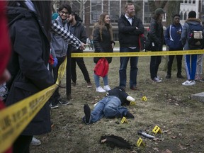 Did the butler do it?
 Students check out a mock crime scene during the Trends in Forensic Sciences conference at the University of Windsor, April 6, 2018.