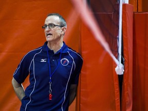 In this Aug. 4, 2014, photo, Rick Butler, a nationally renowned volleyball coach from Chicago, watches a scrimmage during the first day of a volleyball camp at Abbott Sports Complex in Lincoln, Neb. Michigan State University has maintained ties to Butler for decades after he was publicly accused in 1995 of sexually abusing and raping six underage girls he trained in the 1980s. Letters obtained by The Associated Press from accusers' advocates show the school has been under pressure since at least 2017 to sever ties with Butler.