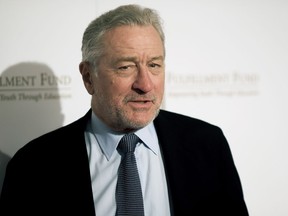 FILE - In this March 13, 2018, file photo, Robert De Niro attends the Legacy of Changing Lives Gala at the Ray Dolby Ballroom in Los Angeles. As the curtain is going up on the 17th Tribeca Film Festival, Robert De Niro is using the spotlight to direct all his ire at President Donald Trump. At a kickoff luncheon for the festival Wednesday, April 18, he referred to Trump as "our Lowlife-in-Chief" and said he "wouldn't recognize the truth if it came inside a bucket of his beloved Colonel Sanders Fried Chicken."