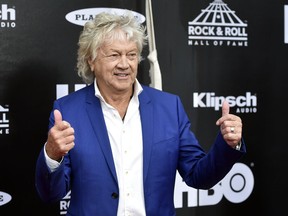 John Lodge, bassist for the Moody Blues, arrives on the red carpet before the Rock and Roll Hall of Fame Induction ceremony, Saturday, April 14, 2018, in Cleveland.