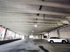 This photo taken at 3:30 p.m. on Wednesday, April 4, 2018, shows the almost-empty main floor of the Pelissier Street parking garage's newly constructed parking area