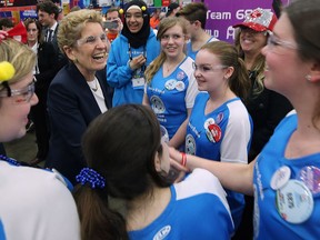 Ontario Premier Kathleen Wynne meets members of the Build-a-Dream Amazon Warriors from Windsor on Friday, April 27, 2018 at the FIRST Robotics World Championships at Cobo Center in Detroit.