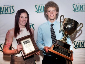 Jessica Masse, left, and Tyler Jones pose after being named Al Hoffman male and female athlete of the year for outstanding achievement, respectively, at Tuesday's St. Clair College Athletic Awards Banquet at the St. Clair Centre for the Arts.