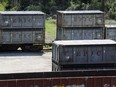 This April 12, 2018 photo shows containers that were loaded with tons of sewage sludge in Parrish, Ala. (Jay Reeves/AP Photo)