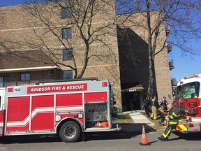 Windsor firefighters wrap up the scene of an incident in a fifth-floor unit at the St. Angela non-profit senior housing building at 1037 McDougall St. on April 20, 2018.