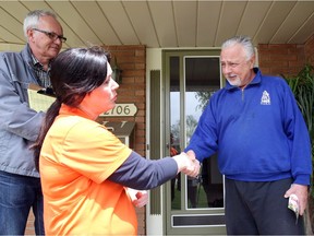 Lisa Gretzky, MPP for Windsor West, chats with NDP supporter Silvio Venerus on St. Patricks Drive as Gretzky campaigned door-to-door with candidate co-ordinator Robin Swainson, left, Monday May 14, 2018.