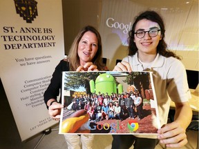 St. Anne High School teacher Karen Gayowsky and grade 12 student Nick Tracey, right, display a photograph of St. Anne students at Google Inc.  Gayowsky, Tracey and other students are preparing for another trip Silicon Valley Wednesday May 16, 2018. "I've been waiting since grade nine for this trip," said Tracey.
