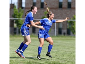 Villanova Wildcats   Danica Paesano, right, jumps for joy after opening the scoring with teammate Kristen Swiatoschik during Wednesday's 3-1 win over the St. Anne Saints in the WECSSAA girls' AAA soccer final at McHugh Park.