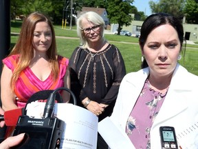 MPP Lisa Gretzky (NDP—Windsor West), right, announces her party's plan for improved mental health care in Windsor at Hotel-Dieu Grace Healthcare on Prince Road, May 25, 2018. Joining Gretzky were Windsor mom Andrea Corby, left, and social worker Suzy Sulaiman.