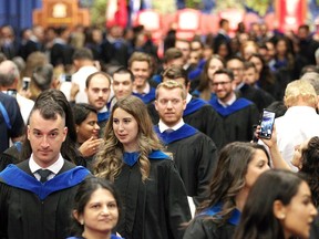 University of Windsor graduates leave their formal convocation and head to a reception at St. Denis Centre on May 30, 2018.