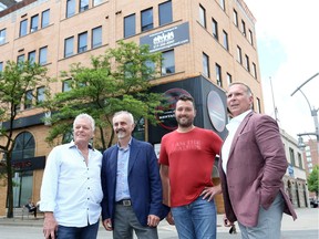 New life for vacant buildings. Dino Maggio, left, Stephen Savage, Anthony Maggio and Brian Schwab, shown May 31, 2018, have formed a partnership between Mid South Land Development and Cypher Systems to purchase and renovate the currently vacant properties that housed the former Beer Market and Chatham Street Grill.