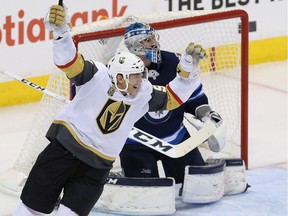 Tomas Nosek of the Vegas Golden Knights celebrates a second period goal by Ryan Reaves against the Winnipeg Jets in Game Five of the Western Conference Finals during the 2018 NHL Stanley Cup Playoffs at Bell MTS Place on May 20, 2018 in Winnipeg.