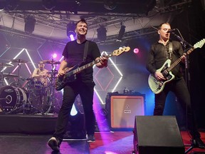 Pop-punk band Blink-182 performing in New York City in June 2016. From left: Travis Barker, Mark Hoppus, and Matt Skiba.