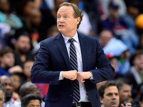 In this April 6, 2018, file photo, Atlanta Hawks coach Mike Budenholzer gestures during the second half of the team's NBA basketball game against the Washington Wizards in Washington. (AP Photo/Nick Wass, File)