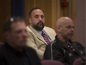 Coun. Rino Bortolin sits in the gallery as Windsor integrity commissioner Bruce Elman addresses city council on May 7, 2018.