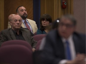 Coun. Rino Bortolin, rear left, sits in the gallery as council listens to the city's Integrity Commissioner, Bruce Elman, front right,  on Monday, May 7, 2018.