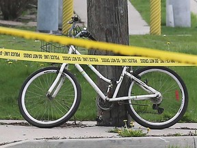 A bicycle at the scene of a collision between a cyclist and a transport truck on College Avenue at Elm Avenue in Windsor on May 6, 2018.