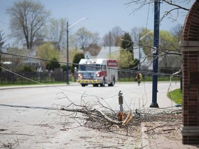 Dangerously downed power lines on Ottawa Street at Marentette Avenue in Windsor after a sudden blast of wind and rain on May 4, 2018.