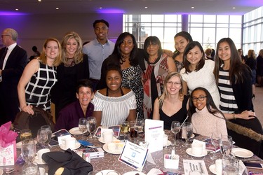 Donna Wellington (fourth from left, back row) of Henry Ford Health System was keynote speaker at Women’s Enterprise Skills Training of Windsor Inc.’s (WEST) International Women’s Day Gala Thursday, March 8 at St. Clair College Centre for the Arts.