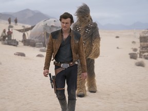 Alden Ehrenreich and Joonas Suotamo in a scene from Solo: A Star Wars Story.