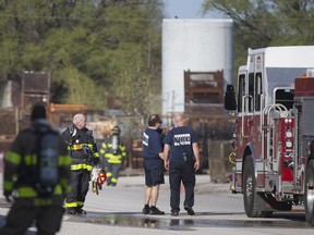 Windsor firefighters  respond to a blaze at AMN Industries on Central Avenue on May 8, 2018.