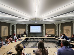 A group involved in last summer's citizen scientist beach water sample collection initiative are shown at the GLIER Great Lakes Institute for Environmental Research during a conference on  May 16, 2018.