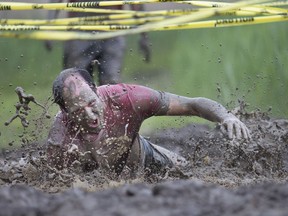 A muddy good time. Rian Sheehan takes a dive into the dirt during the 2018 Heartbreaker Challenge at Malden Park on May 26, 2018.  Proceeds from the race go to Hotel-Dieu Grace Healthcare's cardiac, stroke and pulmonary rehab programs.