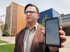 Downtown business owner Jon Liedtke has filed a complaint with the city's integrity commissioner over Mayor Drew Dilkens blocking him on Twitter. Liedtke is shown in front of city hall on Wednesday, May 9, 2018.