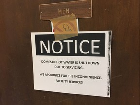 File - Signs are posted at several buildings at the University of Windsor notifying students and staff award that that the hot water has been shut off. Legionella bacteria has been detected in the water system.