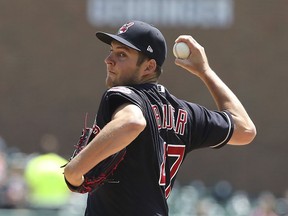 Cleveland Indians starting pitcher Trevor Bauer throws during the first inning of a baseball game against the Detroit Tigers, Wednesday, May 16, 2018, in Detroit.