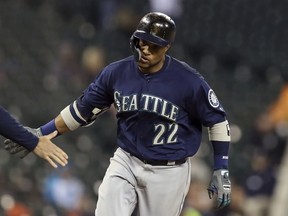 Seattle Mariners' Robinson Cano rounds third base after hitting a three-run home run during the fifth inning of the second game of a baseball doubleheader against the Detroit Tigers, Saturday, May 12, 2018, in Detroit.