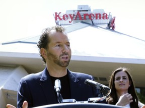 FILE- In this June 7, 2017, file photo, Michael Rapino, President and CEO of Live Nation Entertainment, speaks during a news conference in Seattle. At $70.6 million, Rapino was the top-paid CEO in California for 2017, as calculated by The Associated Press and Equilar, an executive data firm.