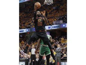 Cleveland Cavaliers' LeBron James (23) shoots against the Boston Celtics in the first half of Game 3 of the NBA basketball Eastern Conference finals, Saturday, May 19, 2018, in Cleveland.