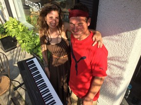 Kate Isley, left, a downtown shopkeeper, rented an electronic keyboard for homeless man Jarrod Zavitz so the talented pianist could busk in Maiden Lane.