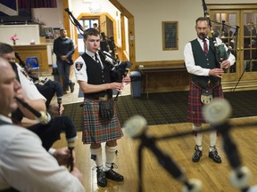 Members of the Scottish Society of Windsor Pipe Band and the Windsor Police Pipe Band collaborate to perform Amazing Grace as part of a world wide tribute to the Manchester Bombing at the Ariana Grande concert on May 12, 2018.